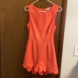Size medium, peach romper. From a smoke free home.